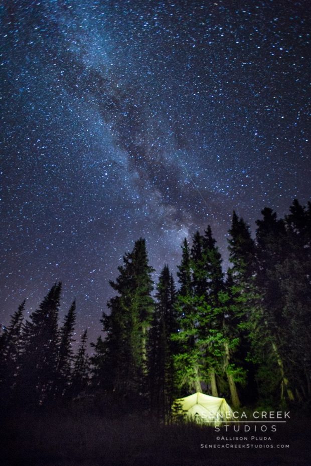 Camping Tent under the milky way stars during the summer perseid meteor shower in the Snowy Range Mountains, Medicine Bow National Forest, Wyoming | SenecaCreekStudios.com by Allison Pluda | Fine Art Nature, Landscape, & Wildlife Archival Wall Prints from the Rocky Mountains | Metal Aluminum Photography Prints | Archival Framed Matted Wall Prints | Wyoming & Western Professional Photography & Astrophotography | Gifts, Souvenirs, & Cards | Seneca Creek Studios Art Gallery, Portrait, & Design Studio in historic downtown Laramie, Wyoming also serving Cheyenne, Fort Collins, and the Front Range of Northern Colorado | Tent Under the Stars for the Perseid Meteor Shower in the Mountains of Wyoming